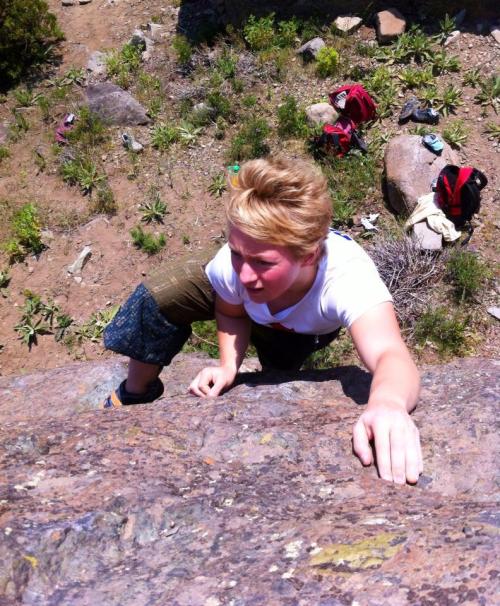 Searching for holds. Photo Credit: Allison Vest